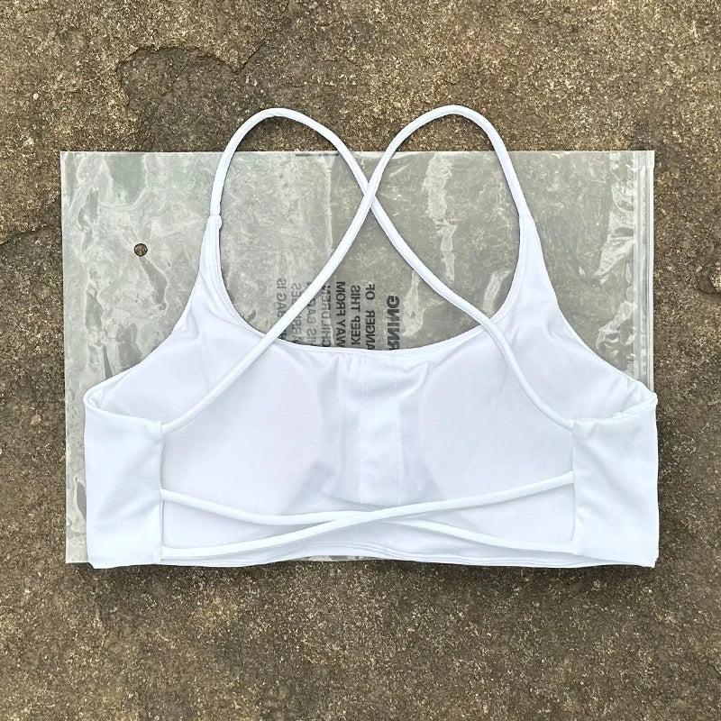 Sujetador deportivo de Color liso para mujer, chaleco de Yoga, Top deportivo para gimnasio, empuje en la espalda hueca con almohadilla para el pecho, cuatro correas cruzadas en la espalda
