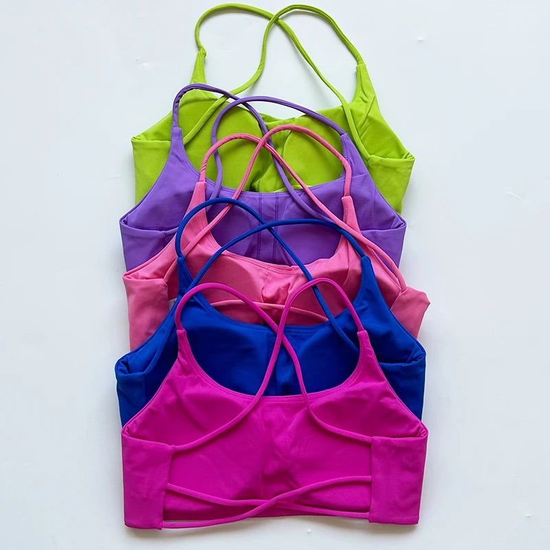 Sujetador deportivo de Color liso para mujer, chaleco de Yoga, Top deportivo para gimnasio, empuje en la espalda hueca con almohadilla para el pecho, cuatro correas cruzadas en la espalda