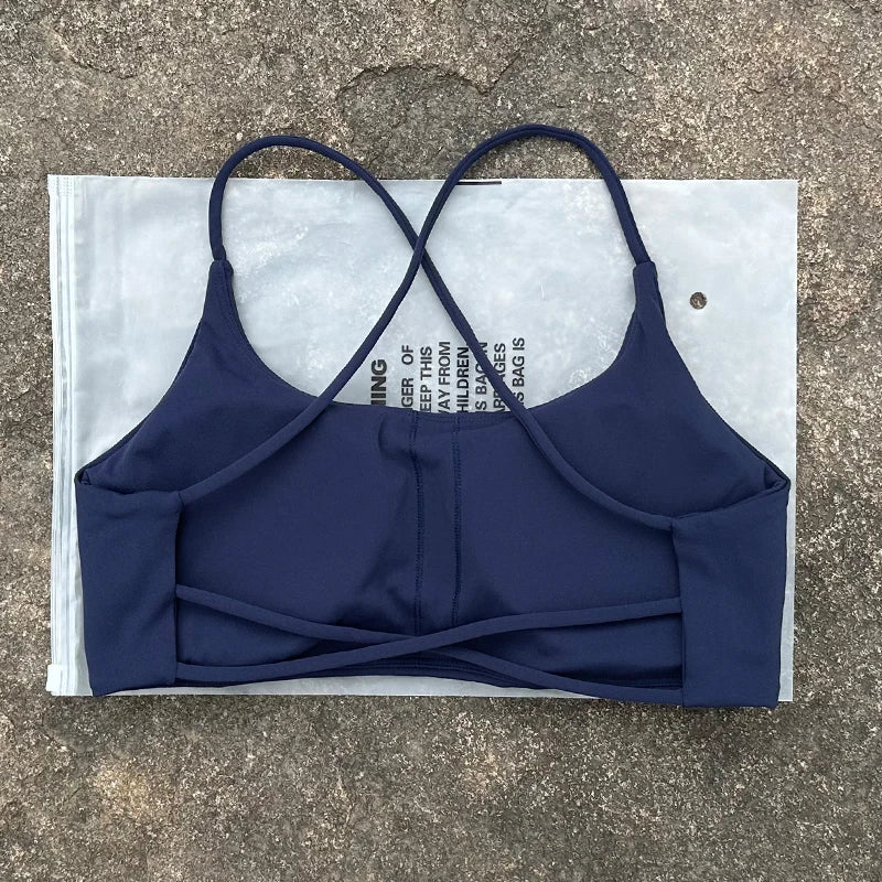 Sujetador deportivo de Color liso para mujer, chaleco de Yoga, Top deportivo para gimnasio, empuje en la espalda hueca con almohadilla para el pecho, cuatro correas cruzadas en la espalda