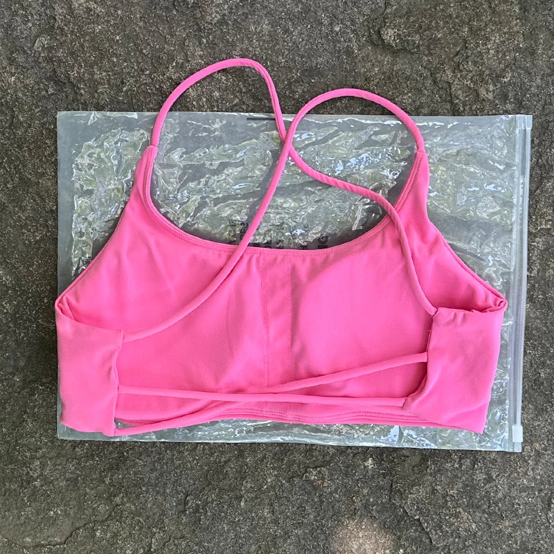 Sujetador deportivo de Color liso para mujer, chaleco de Yoga, Top deportivo para gimnasio, empuje en la espalda hueca con almohadilla para el pecho, cuatro correas cruzadas en la espalda