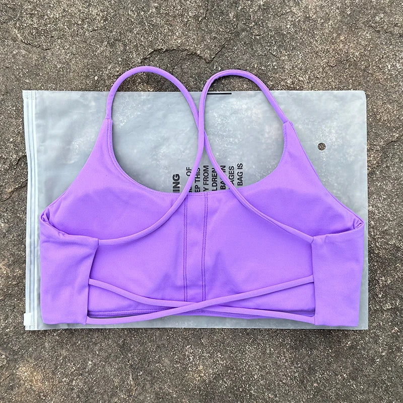 Sujetador deportivo de Color liso para mujer, chaleco de Yoga, Top deportivo para gimnasio, empuje en la espalda hueca con almohadilla para el pecho, cuatro correas cruzadas en la espalda