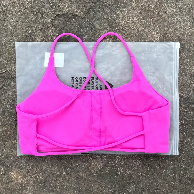 Sujetador deportivo de Color liso para mujer, chaleco de Yoga, Top deportivo para gimnasio, empuje en la espalda hueca con almohadilla para el pecho, cuatro correas cruzadas en la espalda