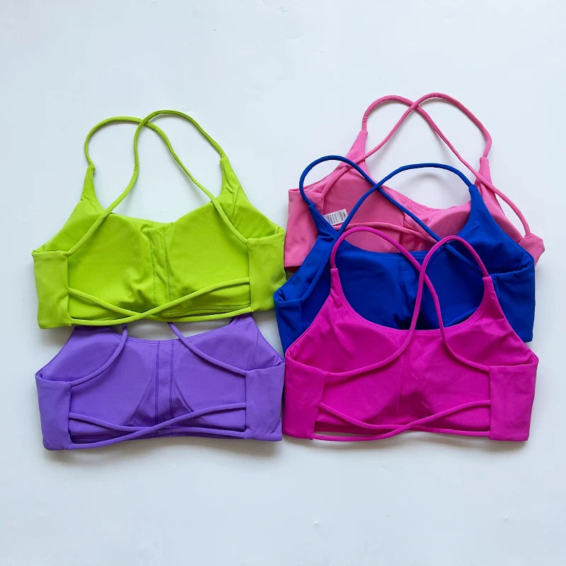 Sujetador deportivo de Color liso para mujer, chaleco de Yoga, Top deportivo para gimnasio, empuje en la espalda hueca con almohadilla para el pecho, cuatro correas cruzadas en la espalda