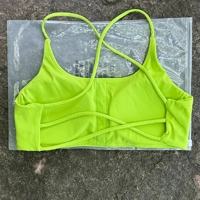 Sujetador deportivo de Color liso para mujer, chaleco de Yoga, Top deportivo para gimnasio, empuje en la espalda hueca con almohadilla para el pecho, cuatro correas cruzadas en la espalda
