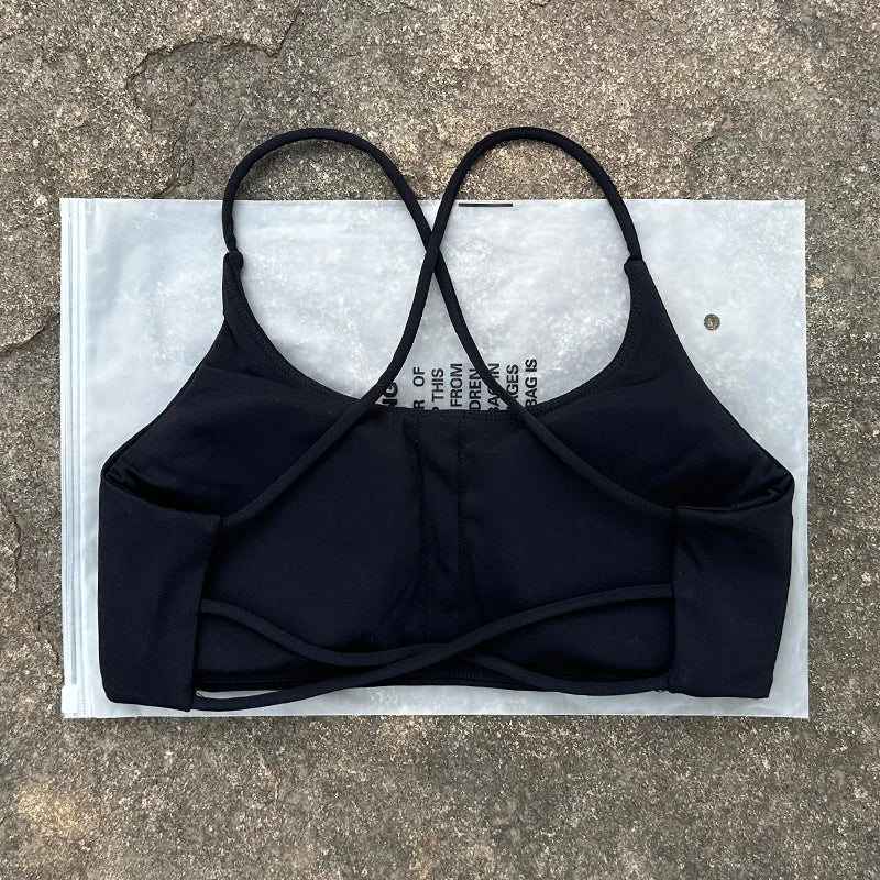 Sujetador deportivo de Color liso para mujer, chaleco de Yoga, Top deportivo para gimnasio, empuje en la espalda hueca con almohadilla para el pecho, cuatro correas cruzadas en la espalda